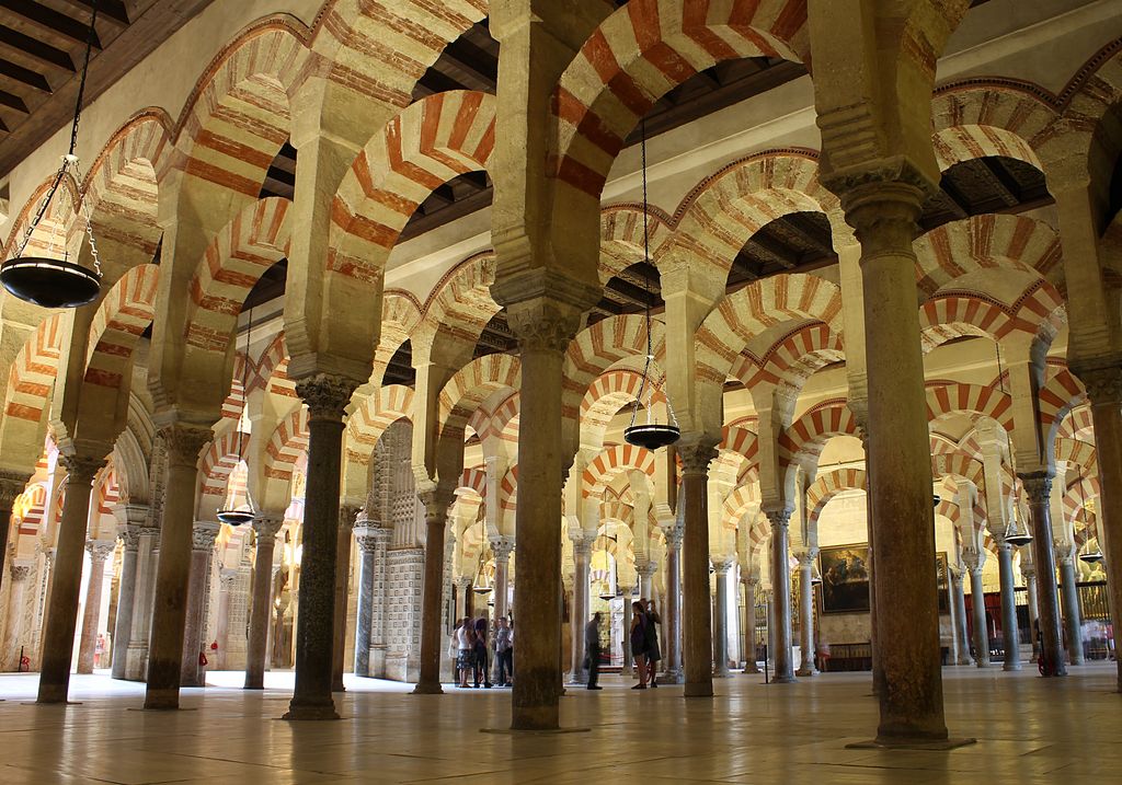 Compare how conquest and later religious use change the interpretation of a monument