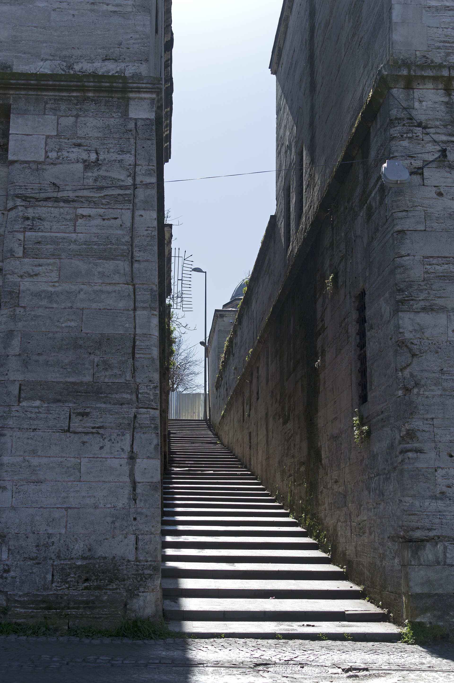 Steep stair between buildings of the Süleymaniye complex on the hill, photographed in 2018.