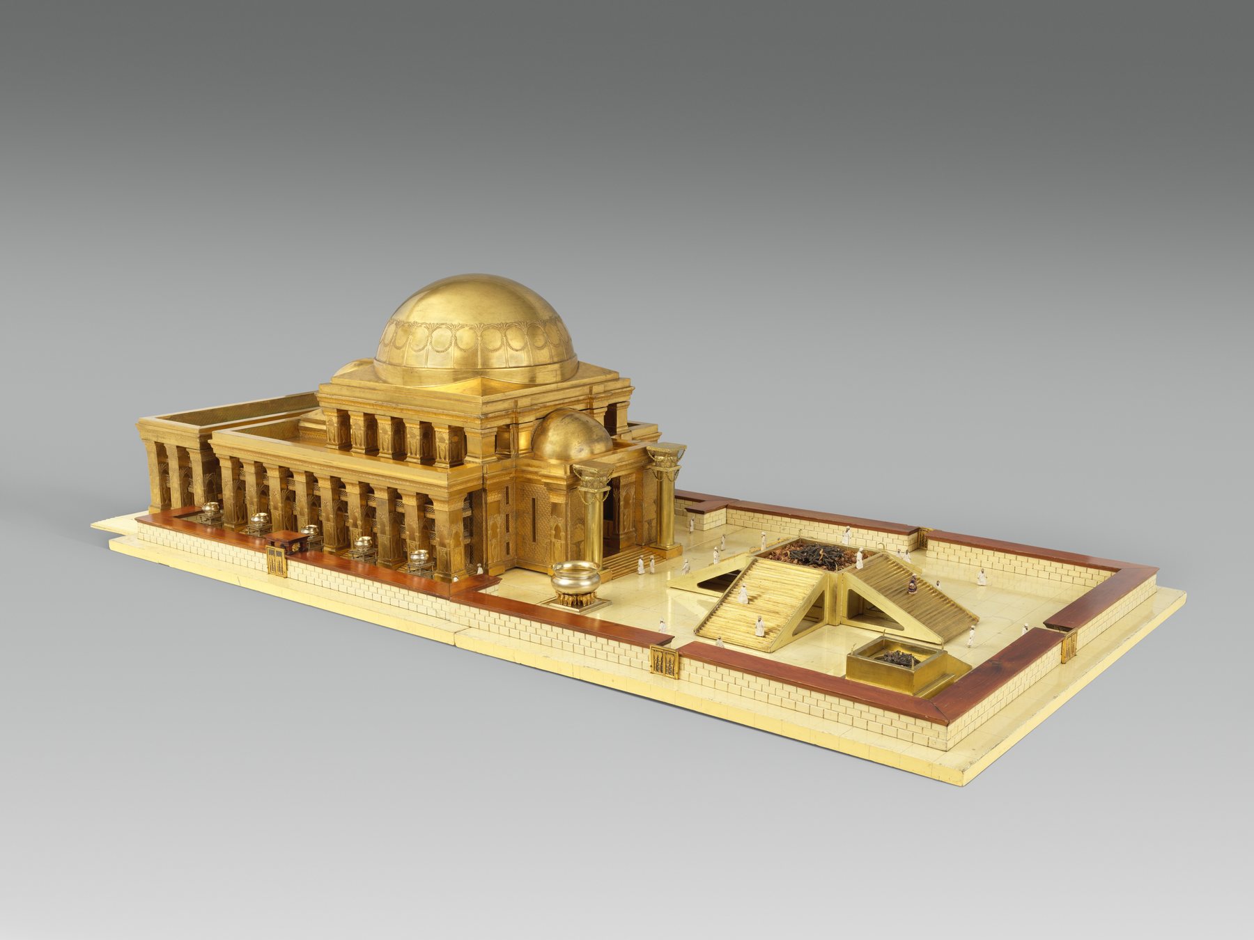 Long gilded nineteenth-century Solomon Temple model with central dome and walled court.