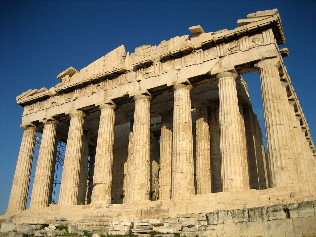 Fluted Doric columns supporting the Parthenon’s weathered entablature and frieze.