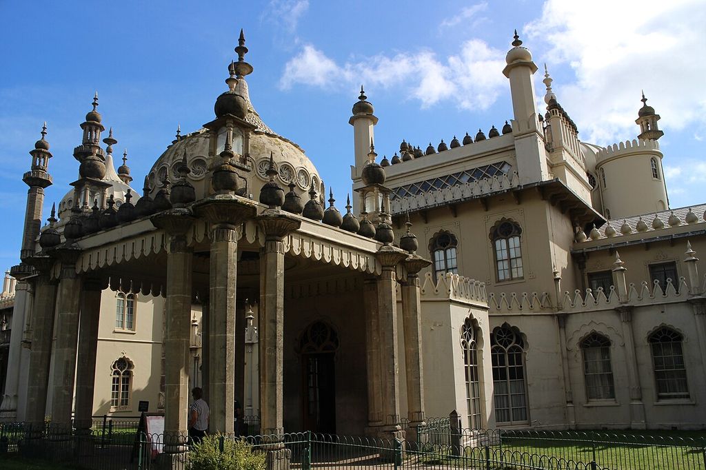 An ornate domed porch, slender columns, pinnacles and arched windows at the Royal Pavilion.