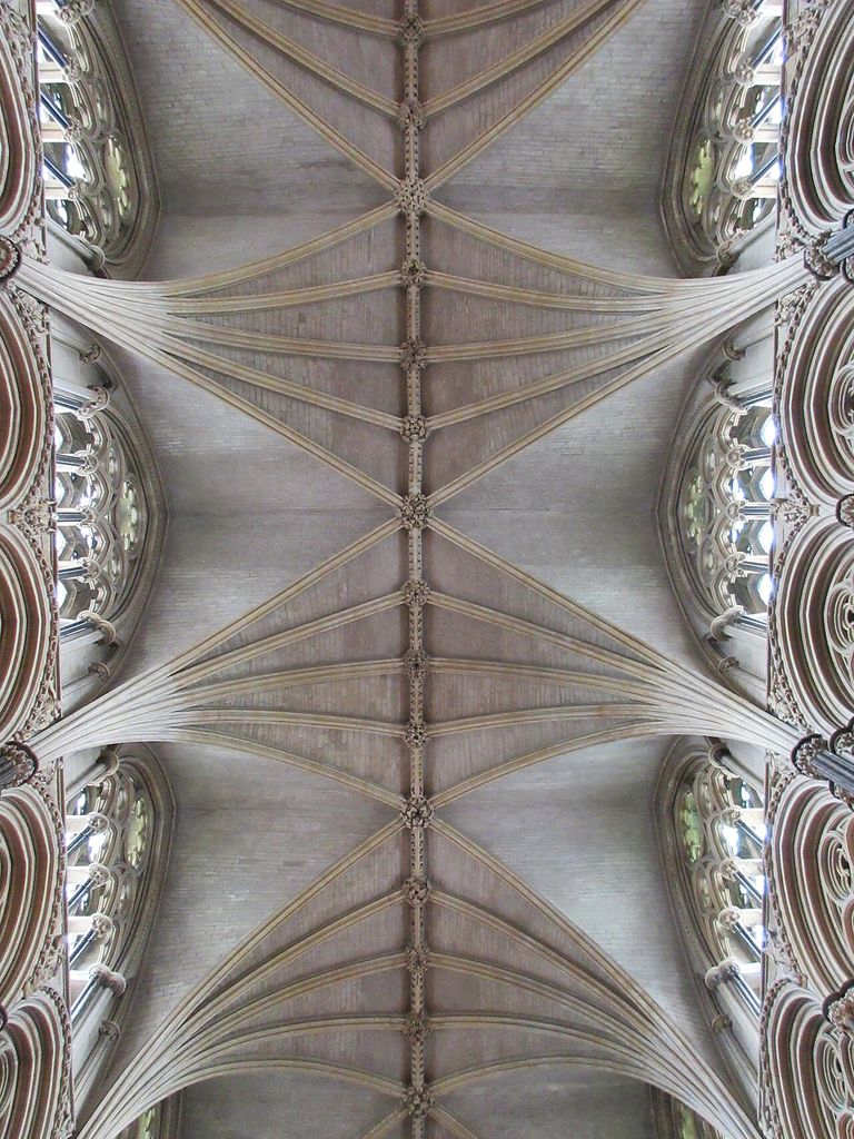 Stone ribs spread from the sides of Lincoln Cathedral’s Angel Choir toward a central ridge lined with carved bosses.