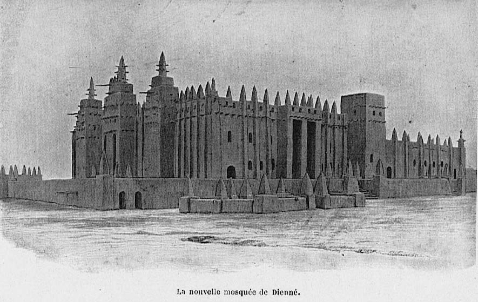 Félix Dubois's circa-1911 monochrome view of the Great Mosque of Djenné from the north-east, with earthen towers and projecting timbers.