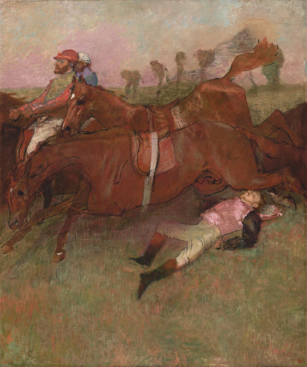 Fallen jockey in pink beneath a group of horses