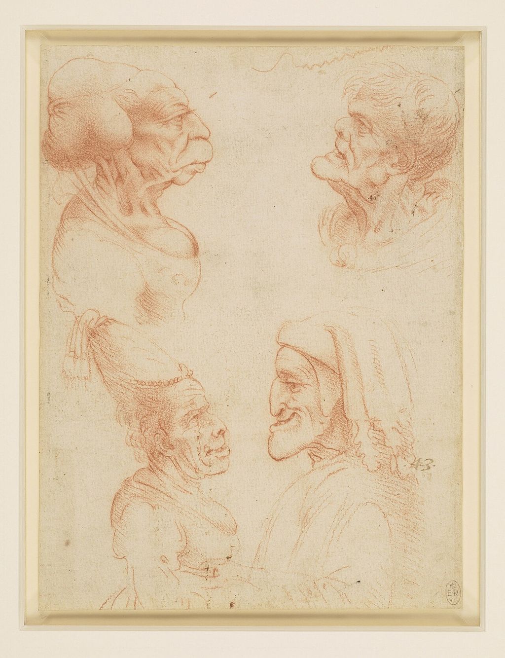 Four grotesque heads after Leonardo.