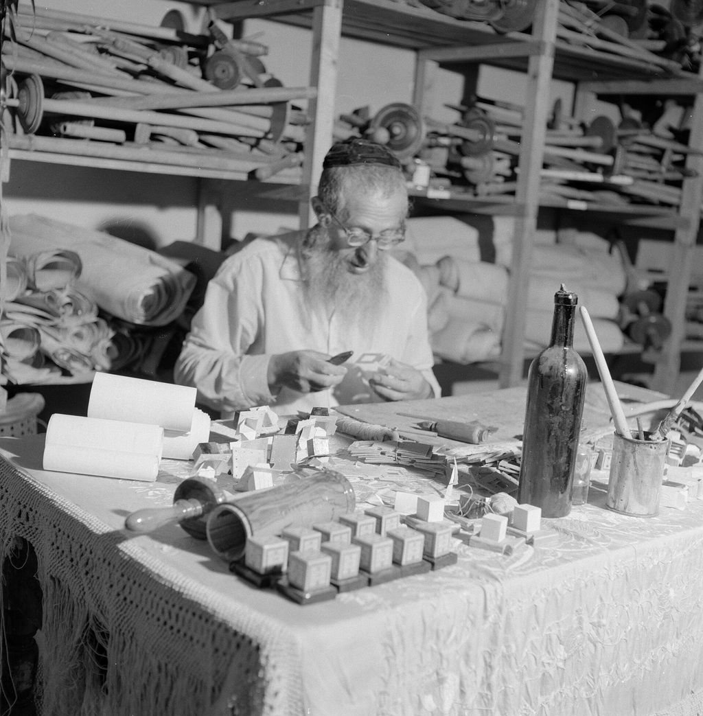 Contextual image of craftsman making tefillin cases in jerusalem.