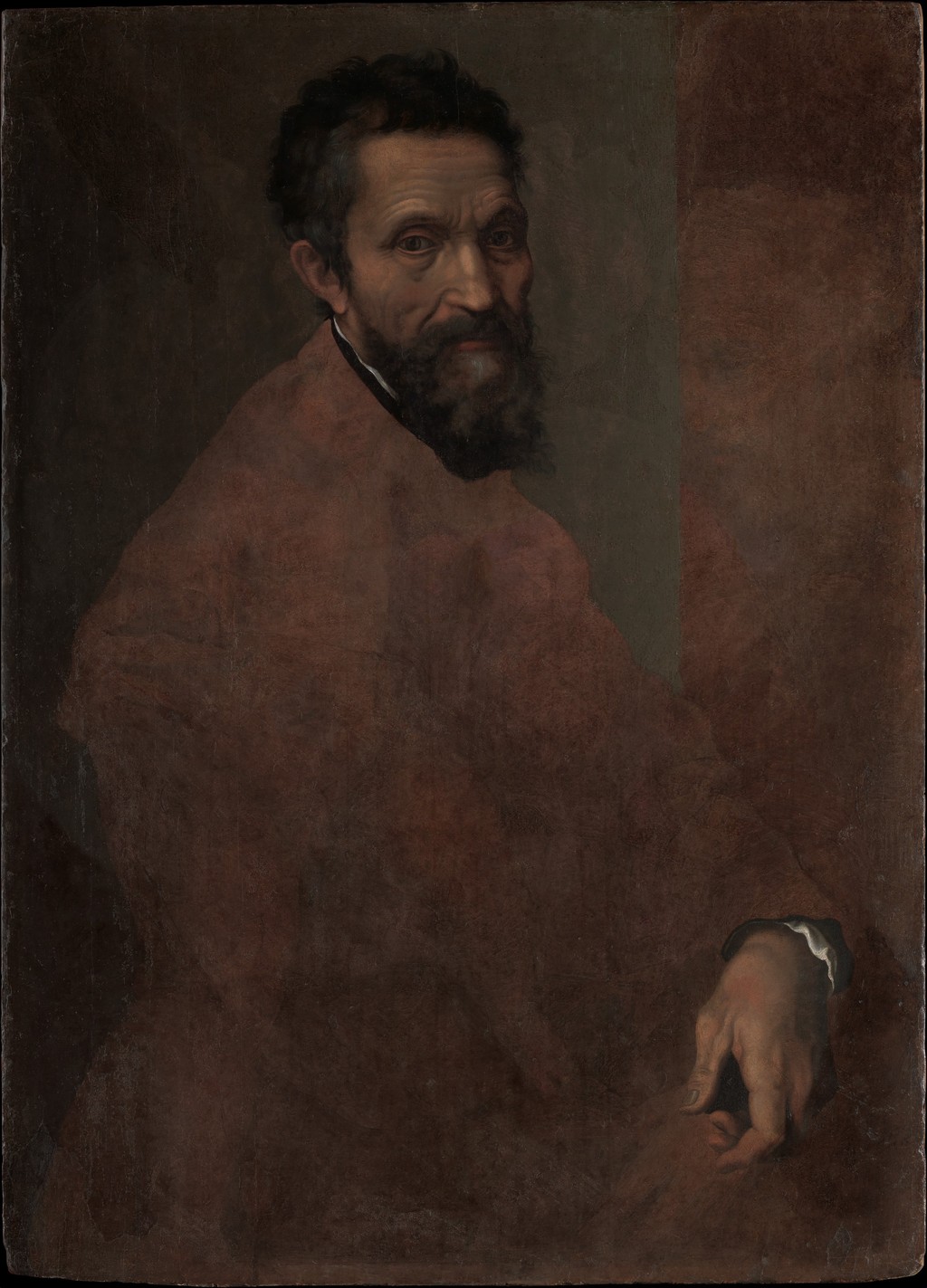Portrait of Michelangelo attributed to Daniele da Volterra, with the artist seated in a brown robe