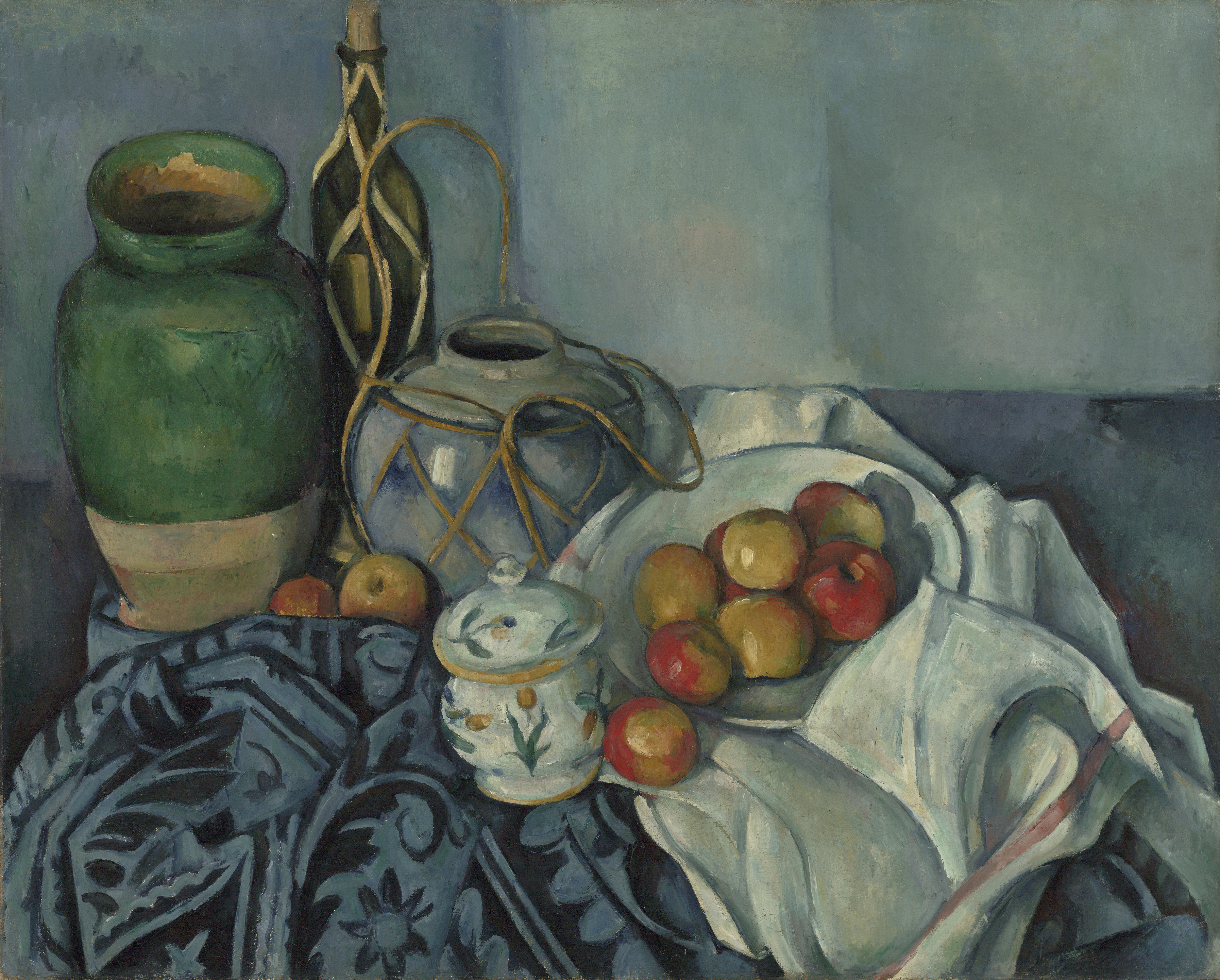 Cézanne's still life with apples, pottery and bottles arranged across blue and white drapery.