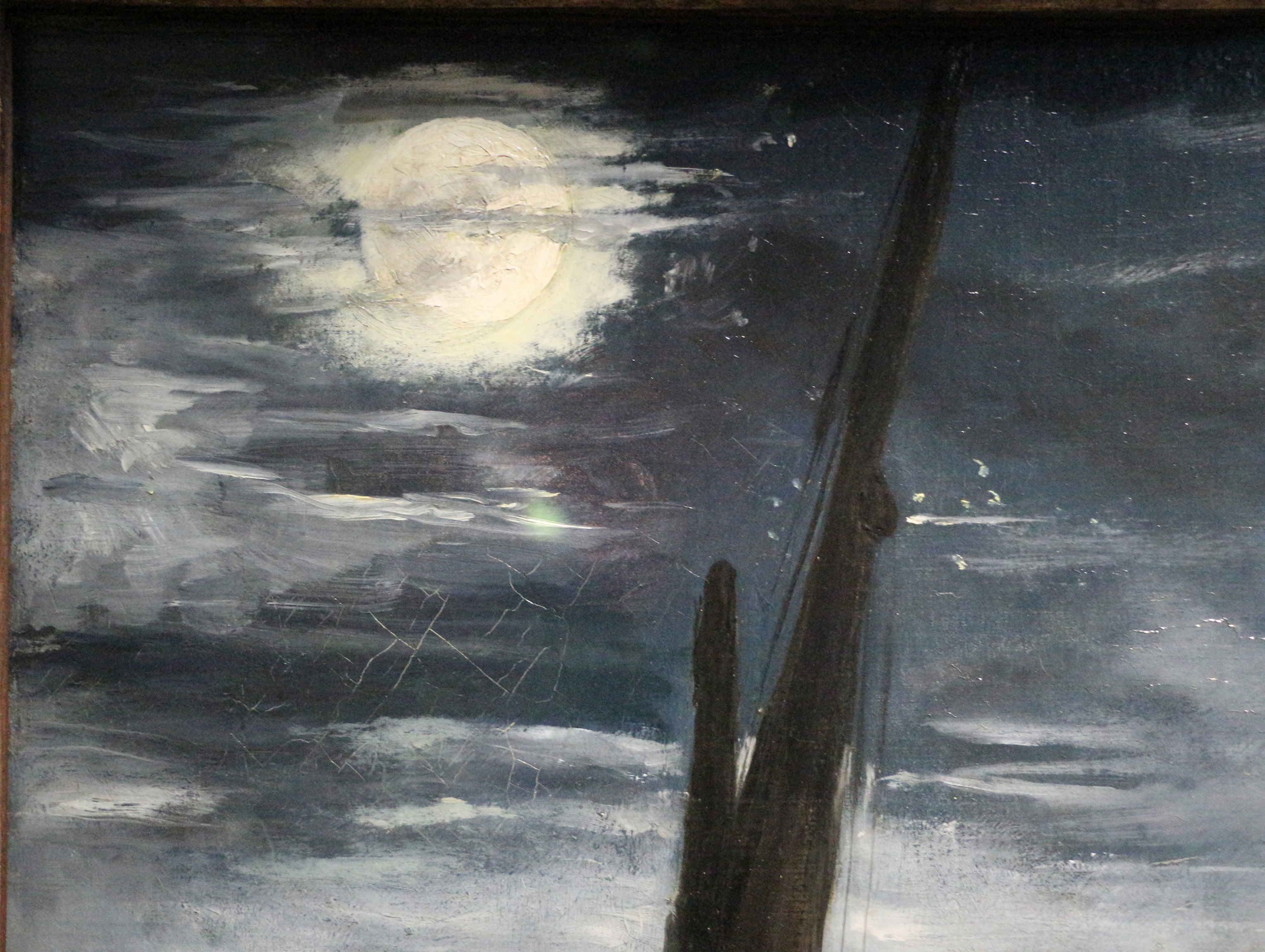 Manet's Moonlight over the Port of Boulogne shows a pale moon behind clouds above dark ship masts and scattered harbour lights.