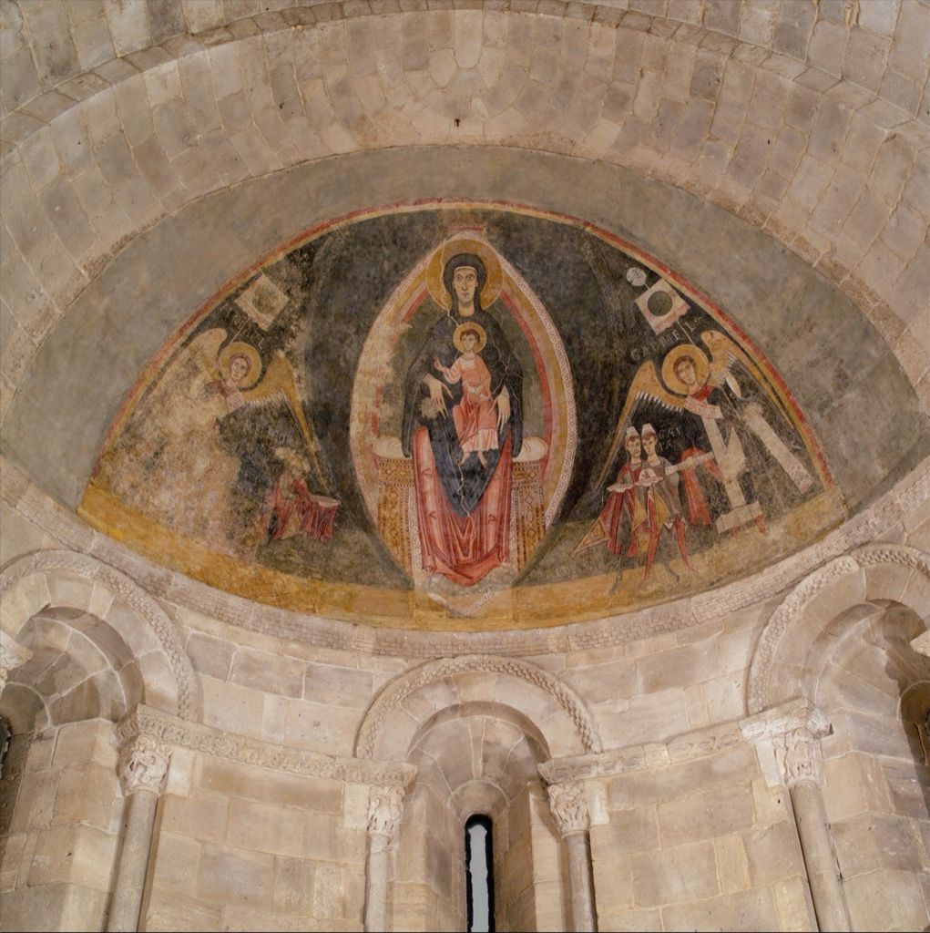 Romanesque apse fresco with the Virgin and Child enthroned above the Magi.