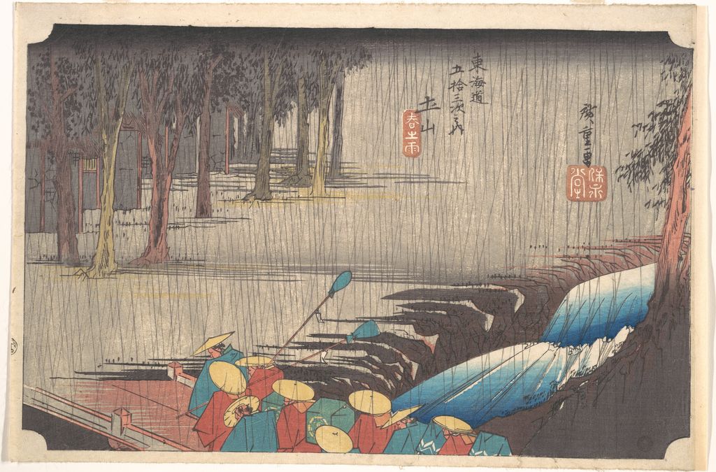Hiroshige's complete print uses blue, green, brown and grey across travellers, trees, rain and water.